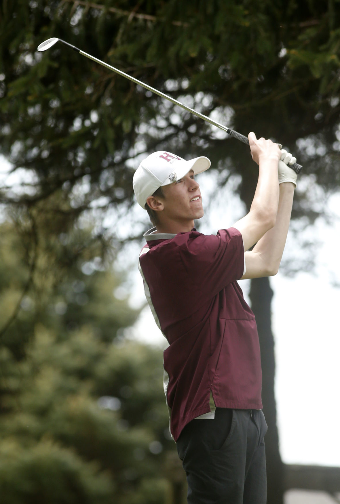 Holmen's Carson Brock tees off